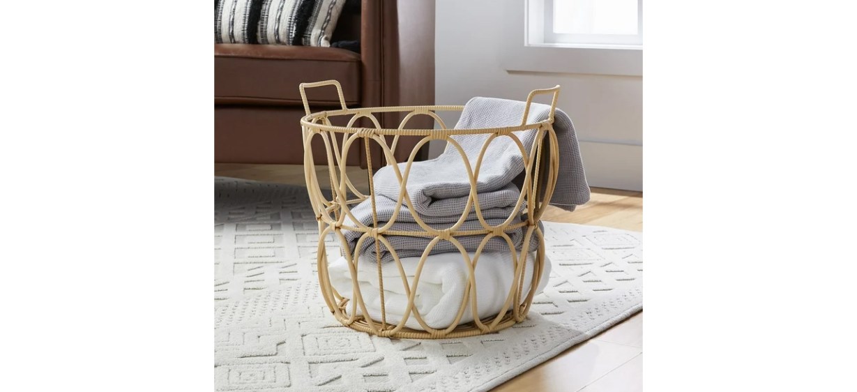 Better Homes &amp; Gardens Large Natural Poly Rattan Open Weave Round Basket with folded blankets inside