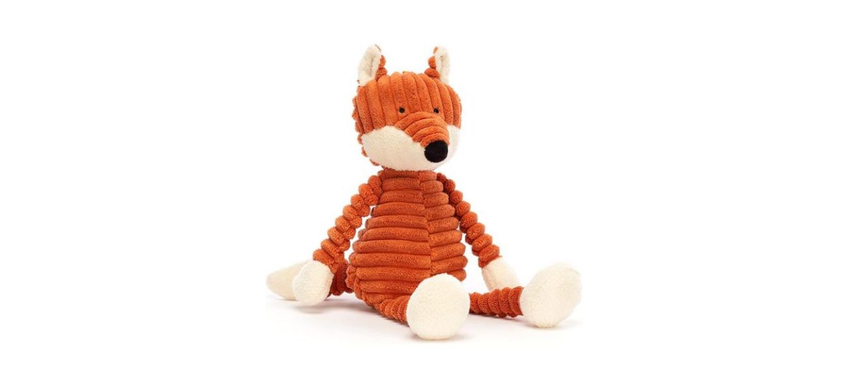 A plush corduroy textured orange fox stuffed animal