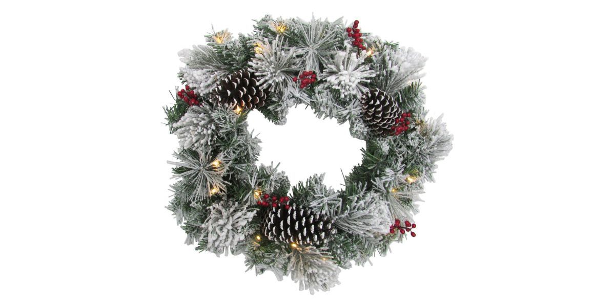 flocked christmas wreath on white background flocked christmas wreath on white background