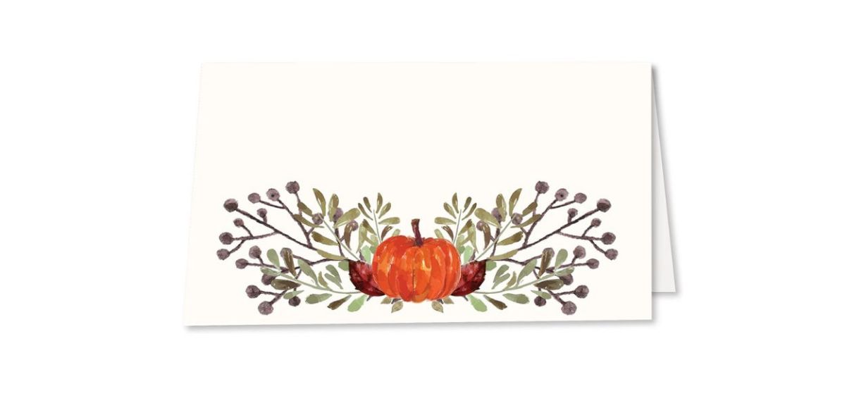 white place card with an image of an orange pumpkin and some branches