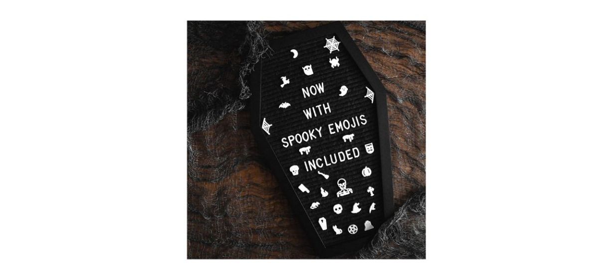 black coffin letter board with white letters and spooky-themed emoji pieces